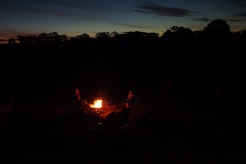 A campfire is practically compulsory in these circumstances. Singing around said campfire is likewise compulsory.